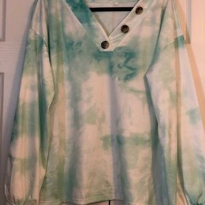 Very soft, tie dye white and green, never worn, long sleeve, do not know brand